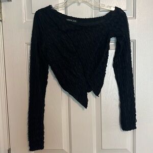 Cute asymmetrical top with peekaboo cutouts
